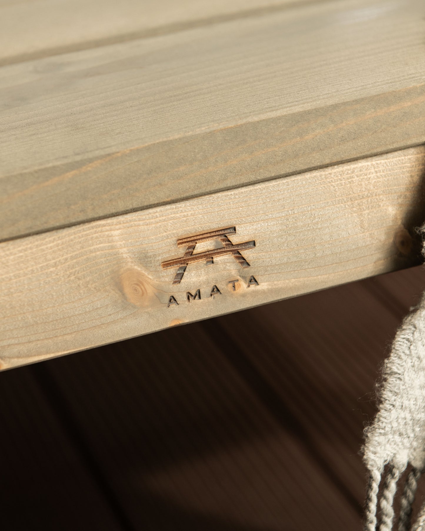 Amata brand logo on AMATA garden bench