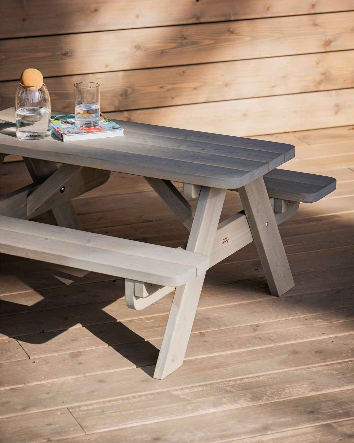 Grey mini A-frame picnic table and chair set on a terrace