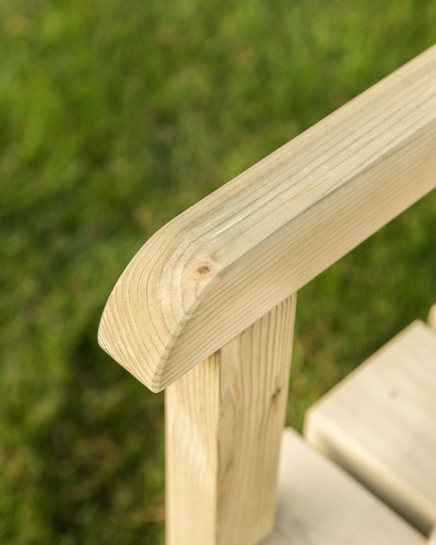 detail look of garden bench armrest 