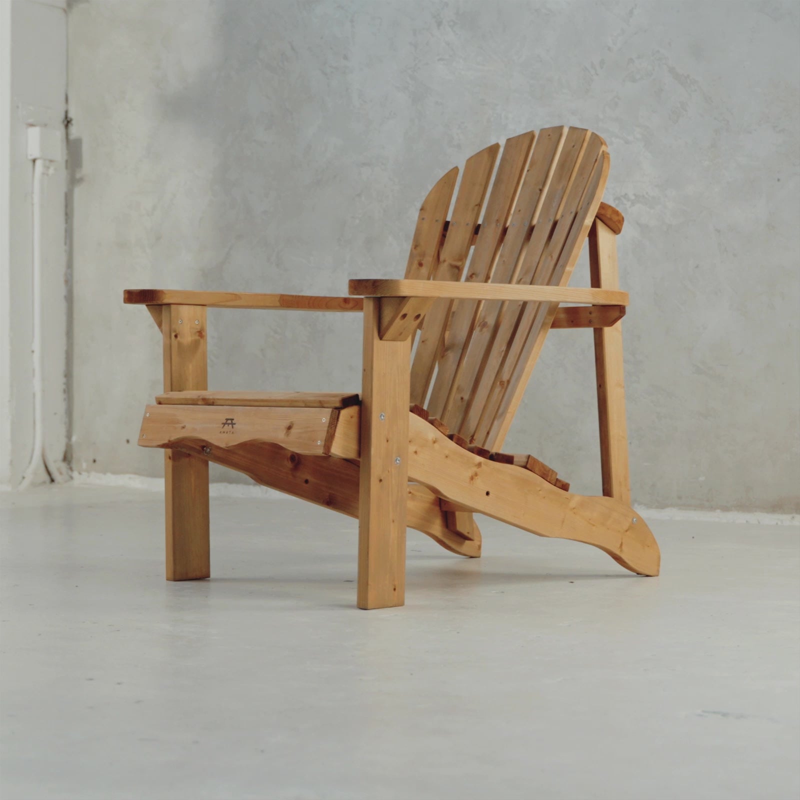 Different angles of the brown wooden Adirondack chair